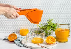 Exprimidor de Naranjas Fluicer 11" Naranja Dreamfarm